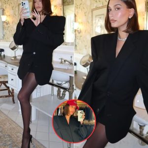 Hailey Bieber puts on a chic display as she pairs oversize black blazer with micro miniskirt and sheer tights in series of 'spring things' snaps